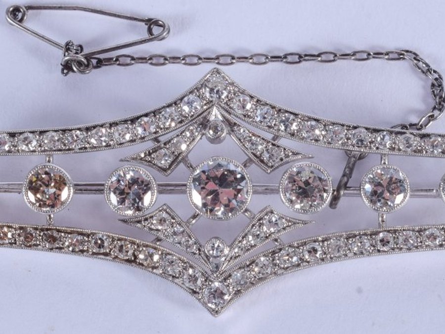 An art deco platinum and diamond brooch